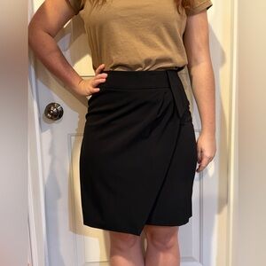 Women’s White House Black Market Black Pencil Skirt. Size 4.